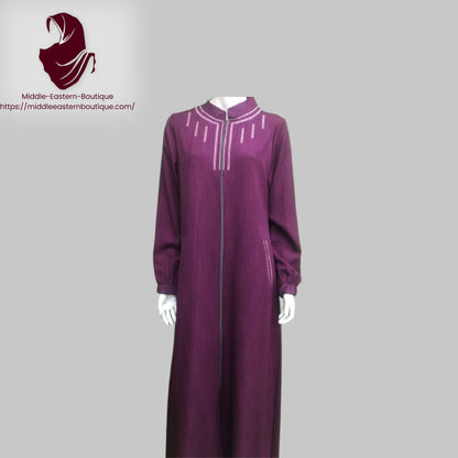 Jilbab zipper, abaya, with white lines extending around the neck and  with buckets,  Very Comfortable. Middle Eastern Boutique